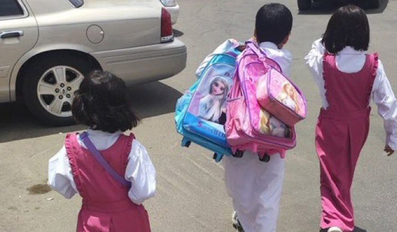 Saudi boy becomes overnight internet sensation for carrying sisters’ bags